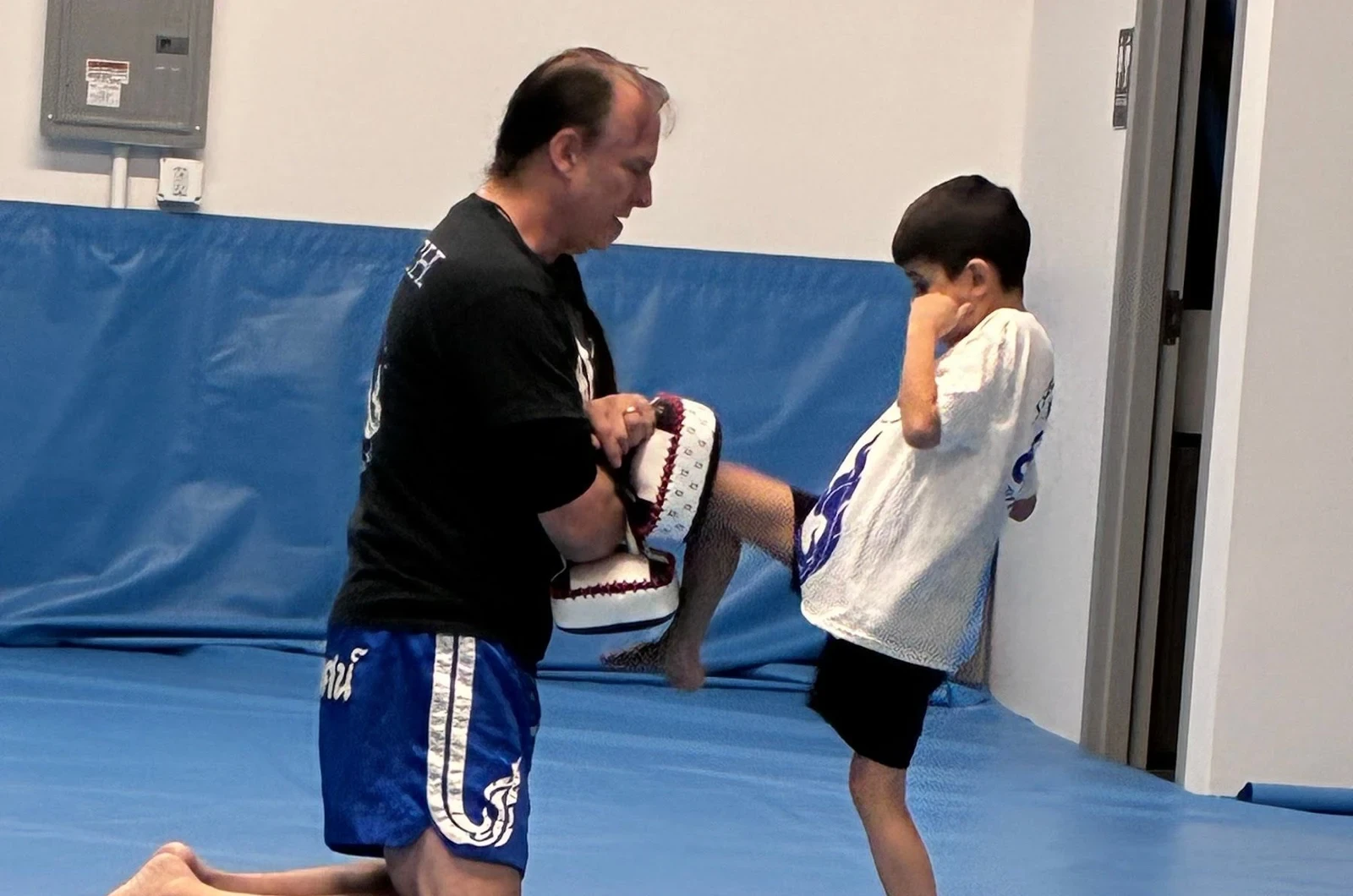 Kids learning patience through martial arts